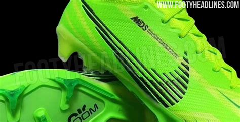 green Nike mercurial football boots